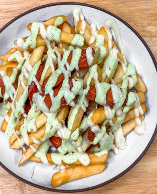 Ecuadorian sausage, fries, tree tomato alioli and Ecuadorian basil green sauce