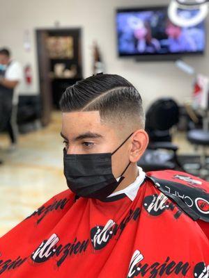 Combover fade with hard part and line up