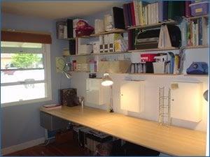 Space for productivity marks this transformed space. An expanse of desk area gives this entrepreneur room to soar!