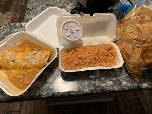 Smothered burrito, side of rice, chips and one small cup of salsa.