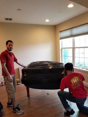 Yes we move pianos! Upright and baby grands no problem. We just have to get used to the smile for the cameras!