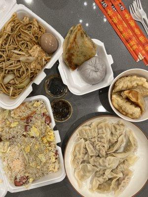 Lo mein, fried rice, steamed bun, scallion pancake, fried dumplings, pork and cabbage dumplings