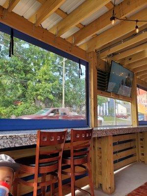 Outside covered seating looking at West Pike