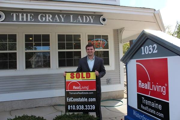 Ed Constable, Your Realtor for Life in front of the Fenton Office