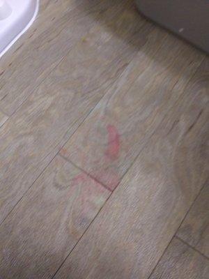 same red stain on bathroom floor