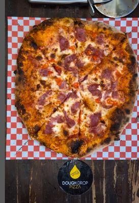 pizza with capicola and red peppers from Dough Drop instagram