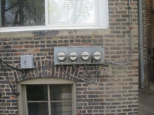 Before: The electrical service on this 3 flat building would not even be adequate for a single family home.