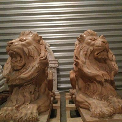 4ft tall red granite lions. 
We set them on pallets before we loaded them for the move