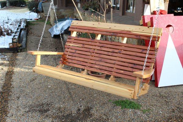 One of our 5' custom built swings using cedar and elm wood, then finished natural. Ready for your covered porch