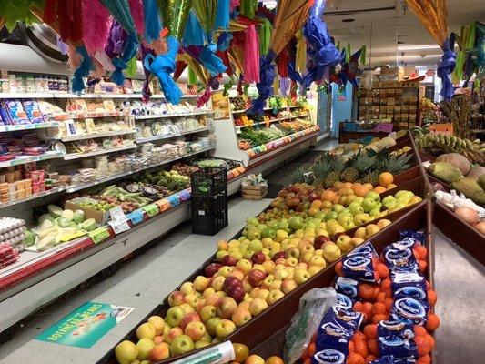 This is our farm fresh Dairy and produce aisle.
You can see our famous piñatas overhead!