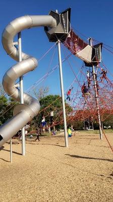 Tons of people and kids climbing