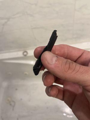 Black plastic coming from pipe