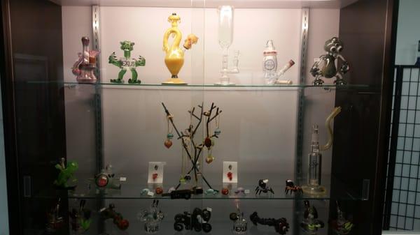 A peek at Smoke Cartel's ever changing case of heady glass! Check out those pendants!