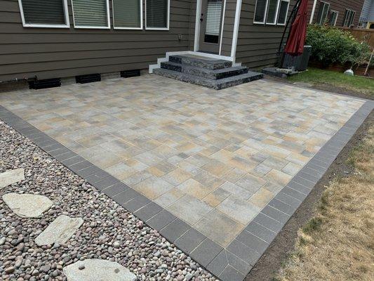 Paver patio with boarder stone , check out the corners, stones cut more fancy to give some character