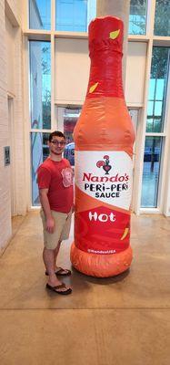 Thing One next to the Nando's Peri- Perio sauce bottle