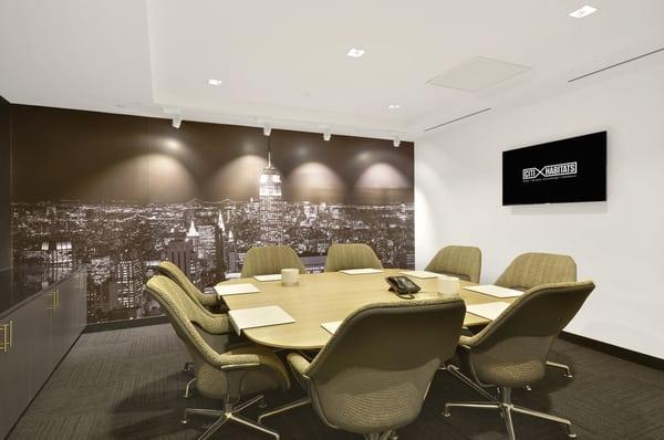 High-tech conference rooms equipped with Apple TV and wireless presentation systems.