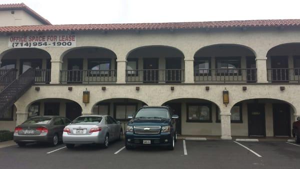 Office building, corner of Edinger Avenue and Grand Avenue behind Yellow Basket Restaurant