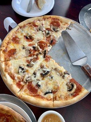 Pepperoni and mushroom pizza