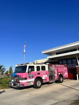 Pink and blue firetruck wrapped for Metro Fire's cancer awareness month