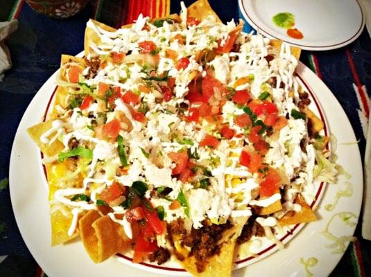 The Nachos Mixtos! topped with LOTS of ingredients