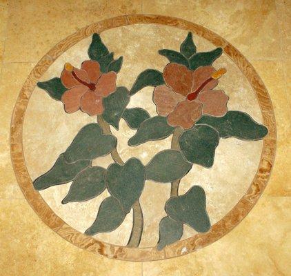 "Two Hibiscus" medallion, set into a travertine floor