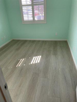 Our bedroom laminate wood floor installed by Javier & Rudolfo of MK Flooring, Las Vegas NV