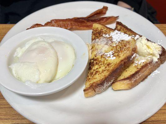 $5.99 All All-American Slam-two poached eggs, bacon, French Toast.