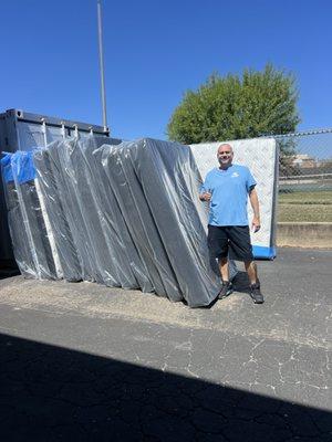 Unloading a mattress truck