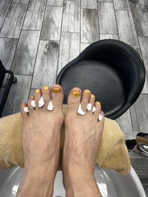 Nails drying after pedicure.