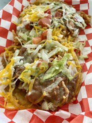 Veggie Taco aka beans and rice with cheese, lettuce and tomato