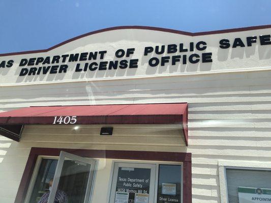 This is what the front of the building looks like it's a small building with a small parking lot