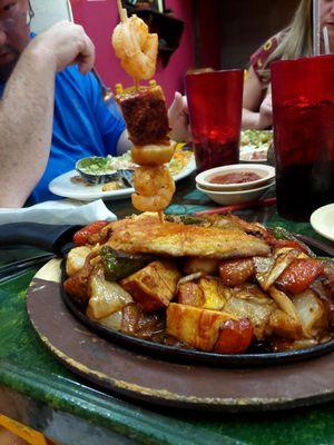 Fajitas Gabriel- skewer has shrimp, Scallops,  crab, and fish.