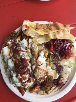 Off-menu special: Syrian rice, lamb gyro, chicken, hummus, salad, pita, and all the sauces.