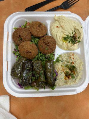 Falafel, hummus, grape leaves and baba ganoush