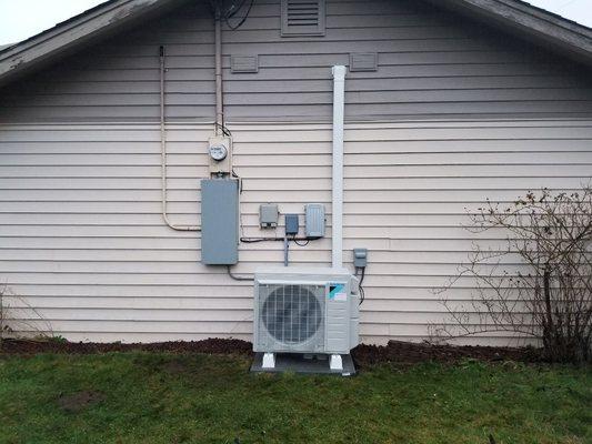 Daikin multi-port heat pump, condition two spaces, or more.