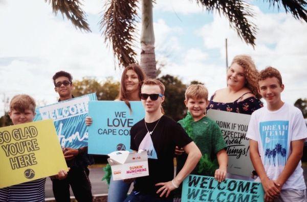 The welcome crew. Welcoming everyone who walks up.