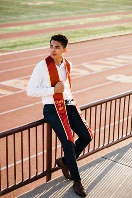 Dress shirt tapered and pants hemmed for a graduation shoot. Fight on! :)