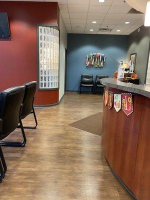 Front desk and waiting room of Core Medical. Very clean and welcoming atmosphere.