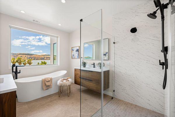 Organic modern bathroom design, showcasing our Parker bathroom vanity collection in Natural Walnut.