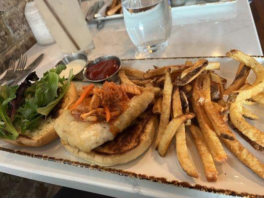 Fish sandwich with French fries