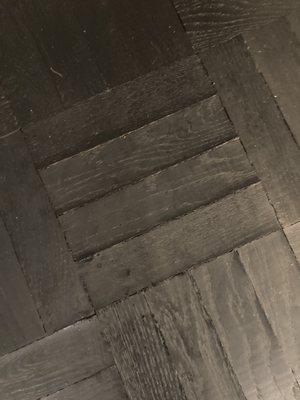 ANOTHER WOOD TILE NEAR WHERE CHAIR WAS CLEANED