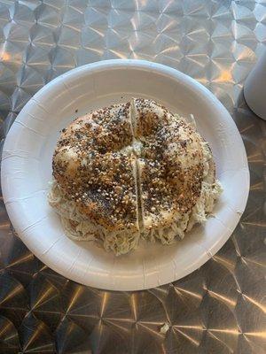 an everything bagel with chicken salad