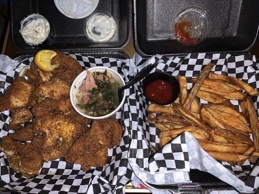 Catfish nuggets, greens, and fries.