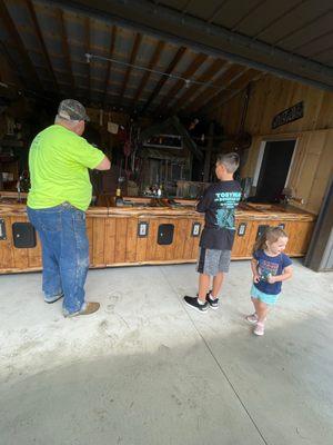 New shooting gallery with animatronics and themed elements.