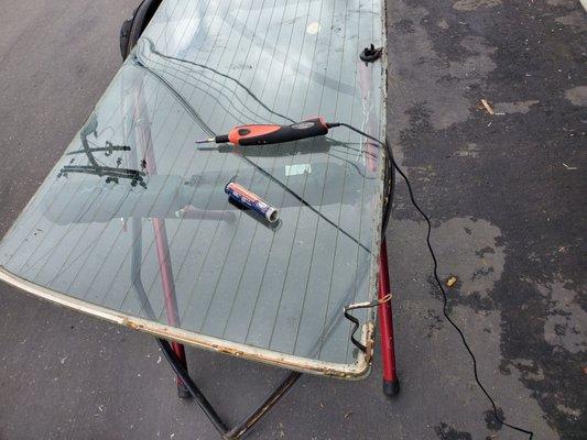 Backglass defroster repair