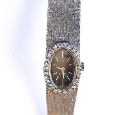 Omega Vintage Ladies 18kt Gold Diamond Watch, like new.