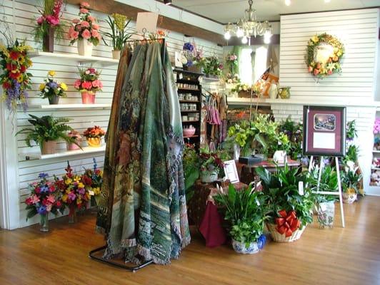 We carry an array of gifts and silk flowers. Candles, tapestries, plants and plush animals.