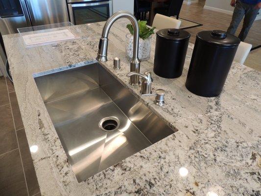 Kitchen sink and faucet installations