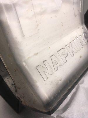 Napkins are used to clean your hands off with. Who wants to grab napkins out of a filthy dispenser that has dried of nasty food on it