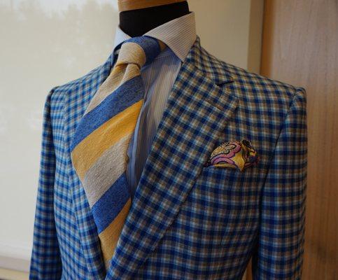 Wool sport coat paired with linen tie. Perfect look for the Spring and Summer!